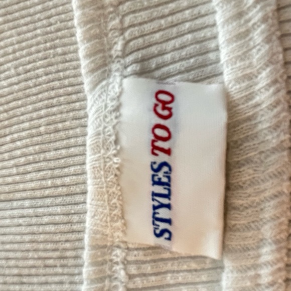 3/$20 when you bundle White Ribbed Sleeveless Tank Top - Picture 3 of 4